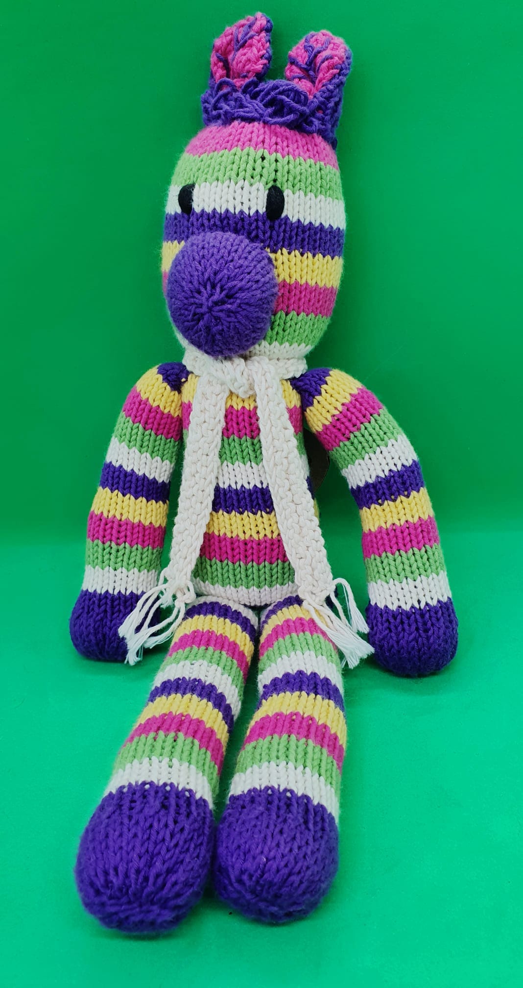 Kenana Knitters, Rainbow Zebra with White Scarf