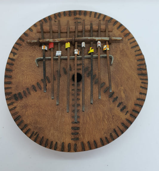 Round Thumb Piano