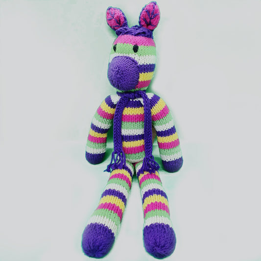 Kenana Knitters, Rainbow Zebra with Purple Scarf